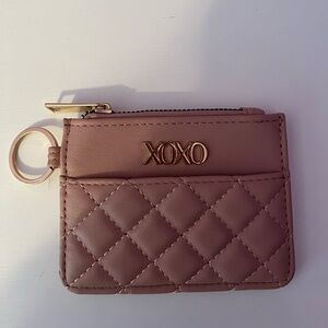 Small mauve colored wallet